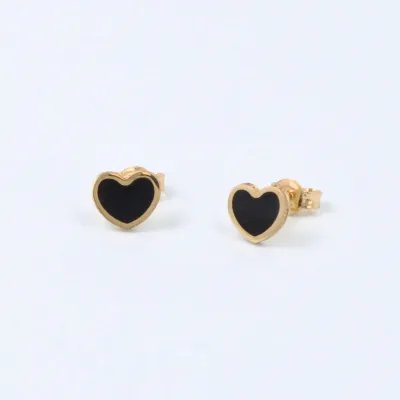 Heart-shaped yellow gold and onyx paste earrings
