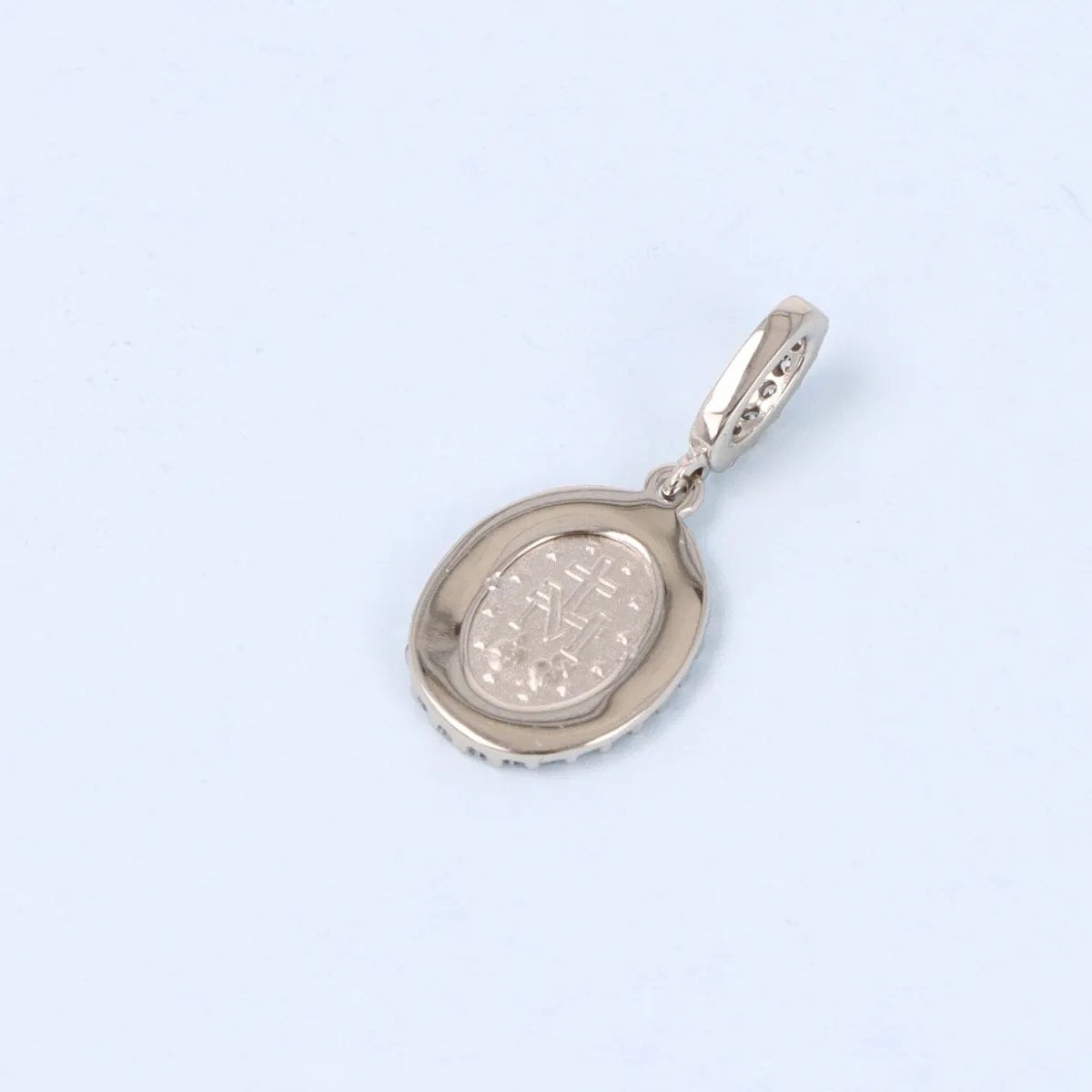 White gold and zirconia medal with miraculous Madonna