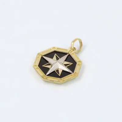 Two-tone compass pendant with onyx paste