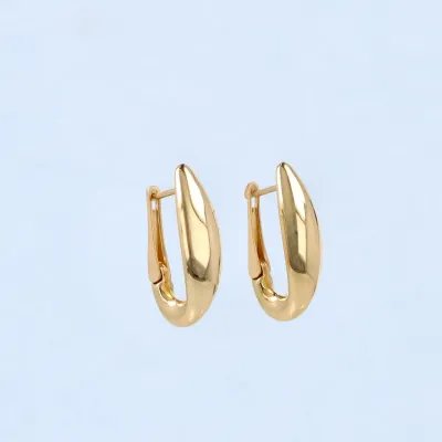 Domed oval earrings in yellow gold