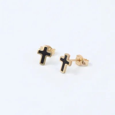 Yellow gold and onyx paste cross-shaped earrings