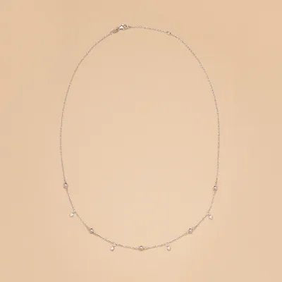 White gold necklace with spheres and cubic zirconia