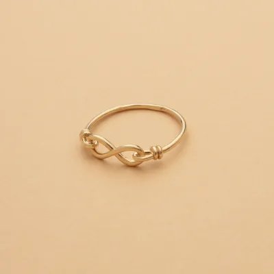 Yellow gold ring with infinity sign