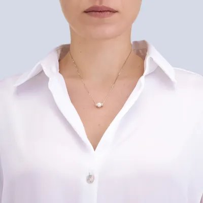 Yellow gold necklace with pearl and zirconia