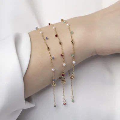 Yellow gold bracelet with natural stones and pearls in three color versions
