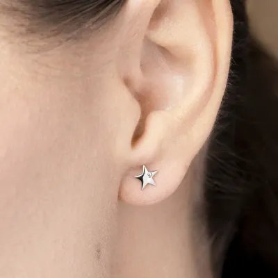 White gold star-shaped earrings with cubic zirconia