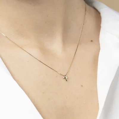 Yellow gold cross necklace
