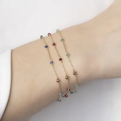 Yellow gold bracelet with natural stones in three color versions
