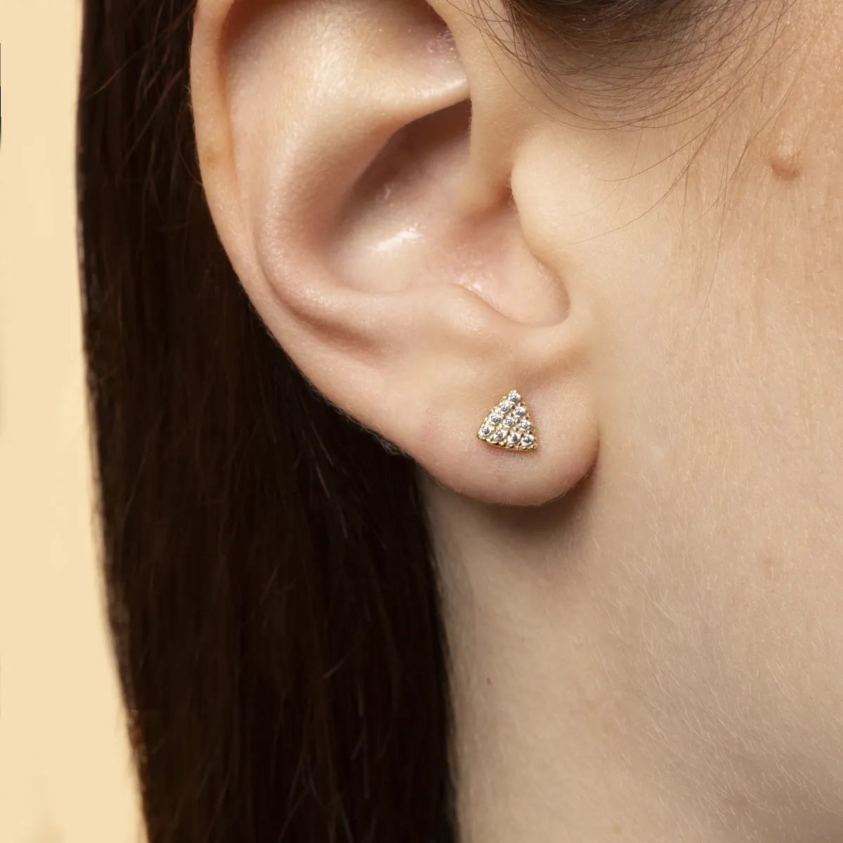 Yellow gold triangular earrings with cubic zirconia