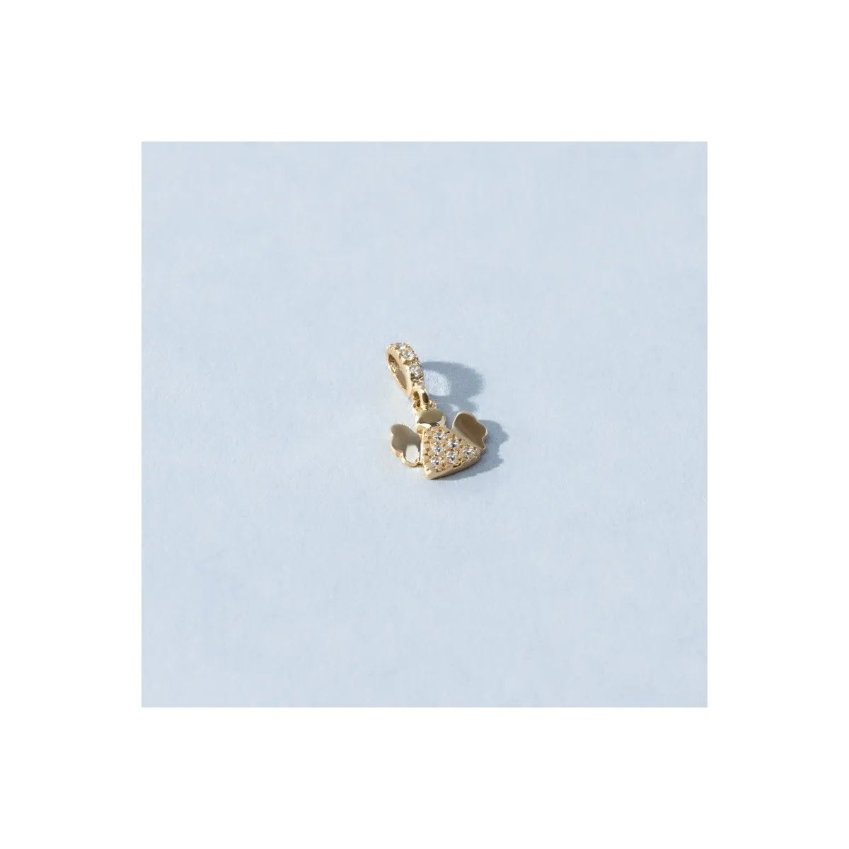 Yellow gold pendant in the shape of an angel with zirconia