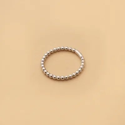 White gold ring with balls