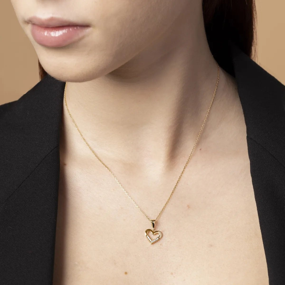 Yellow gold heart-shaped pendant with cubic zirconia