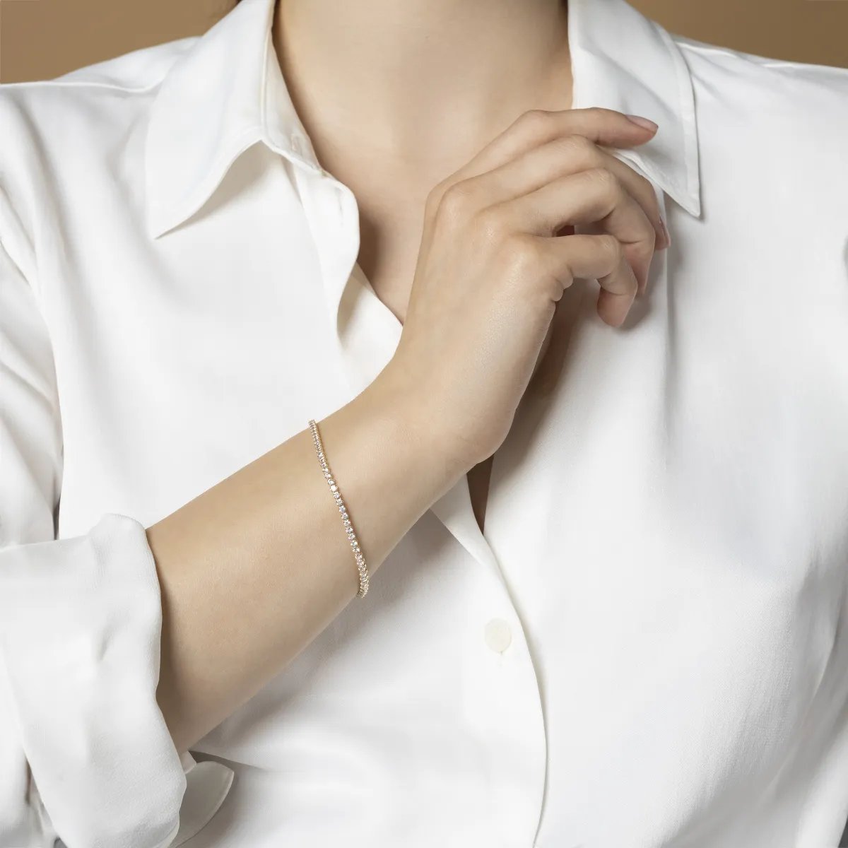 Yellow gold tennis bracelet with cubic zirconia