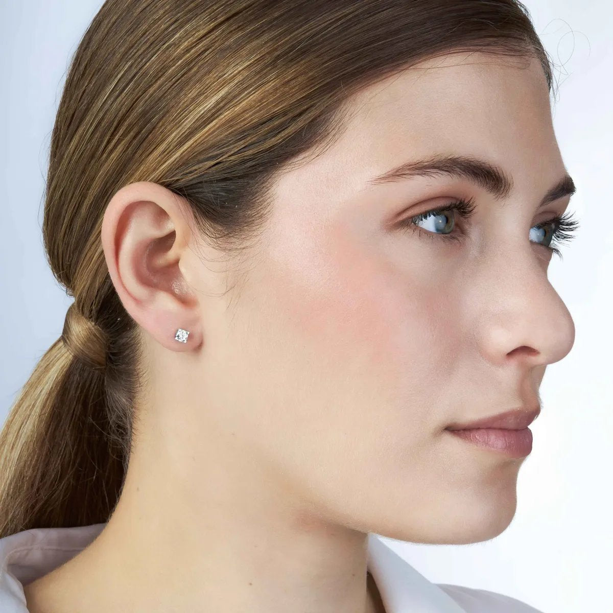 "Punto luce" earrings in white gold with zirconia