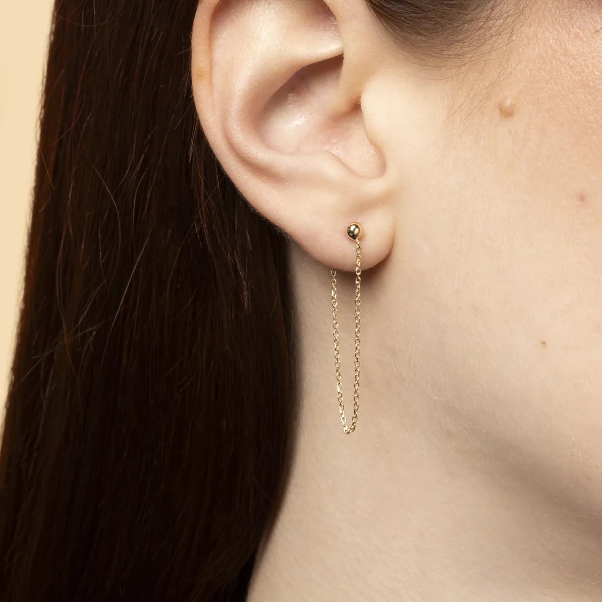 Yellow gold earrings with chain