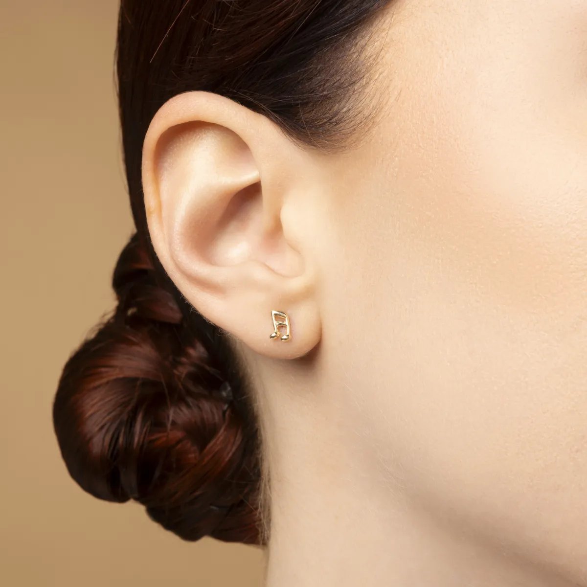 Yellow gold musical note earrings