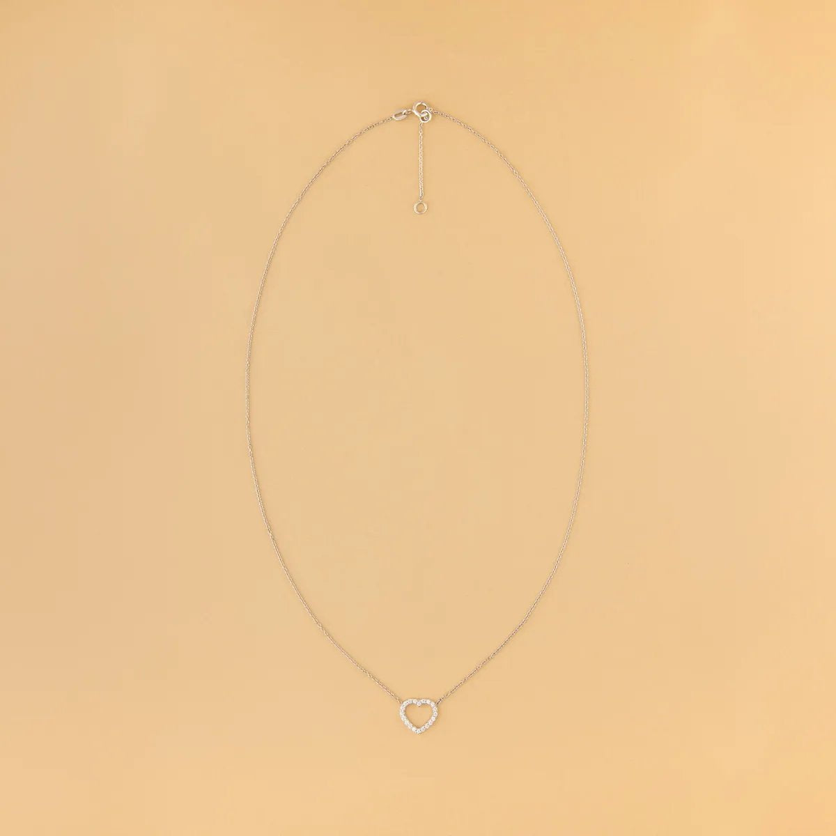 White gold neclace with heart-shaped pendant with cubic zirconia