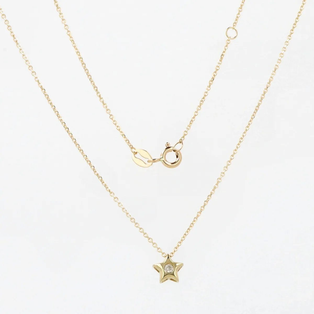 Lightweight yellow gold necklace with zirconia star