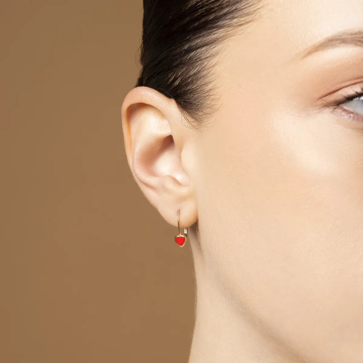 Yellow gold baby earrings with red enameled hearts