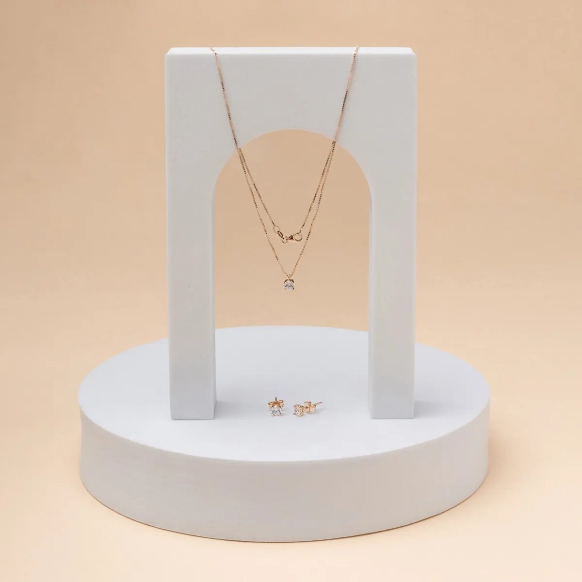 Rose gold solitare set with cubic zirconia: necklace and earrings