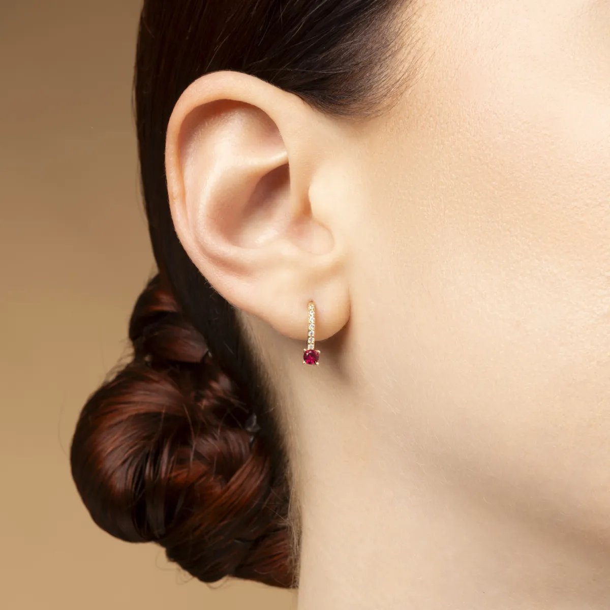 Yellow gold baby earrings with white and red cubic zirconia