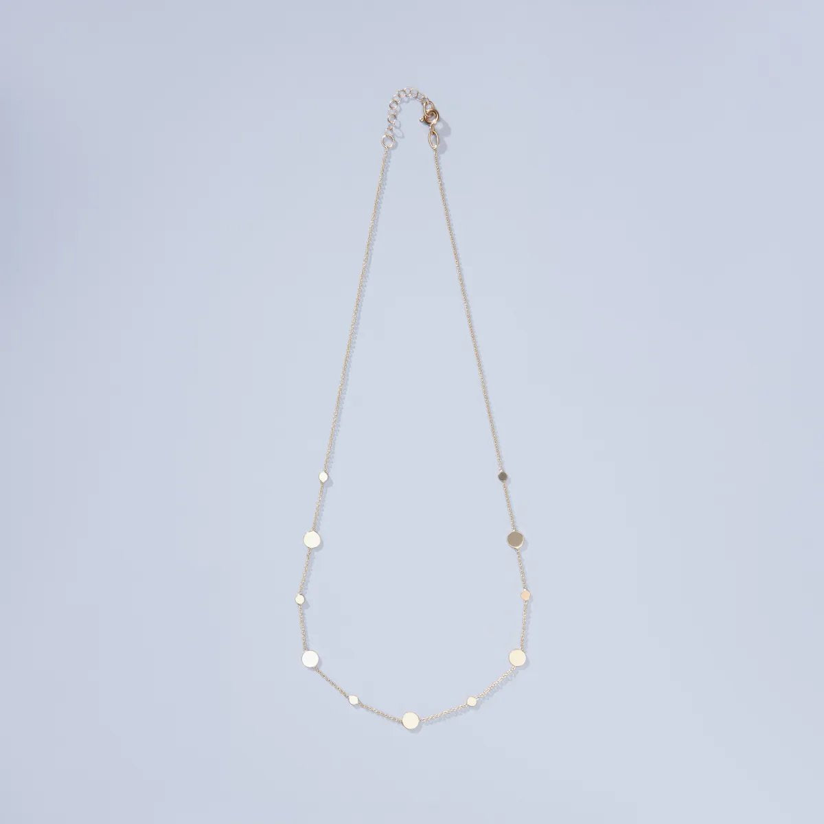 Yellow gold necklace with plate circle elements