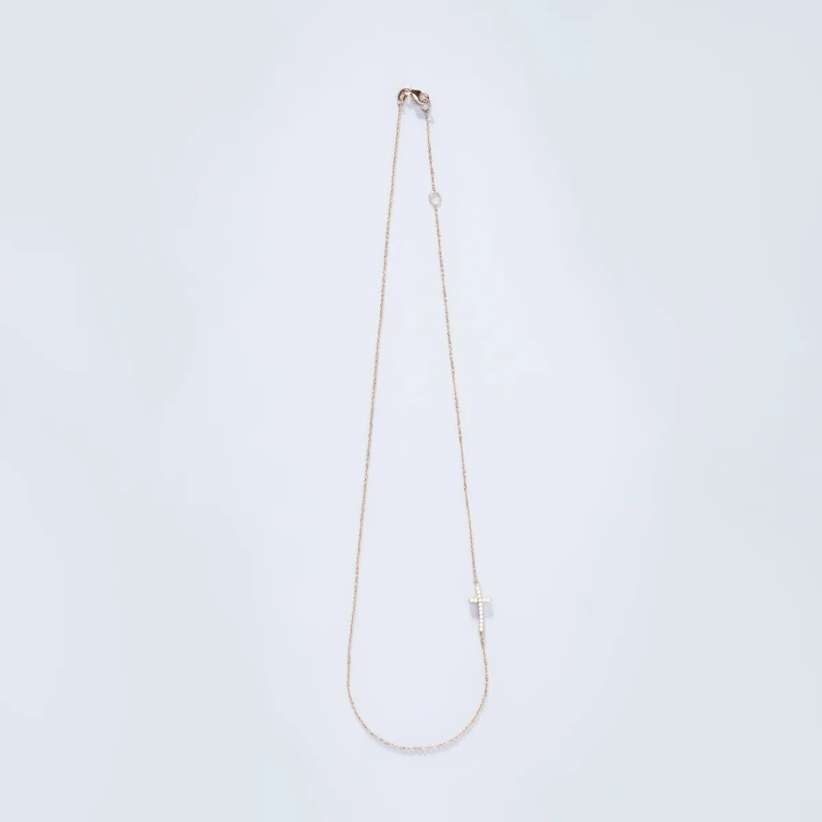 Yellow gold necklace with cross and zircons