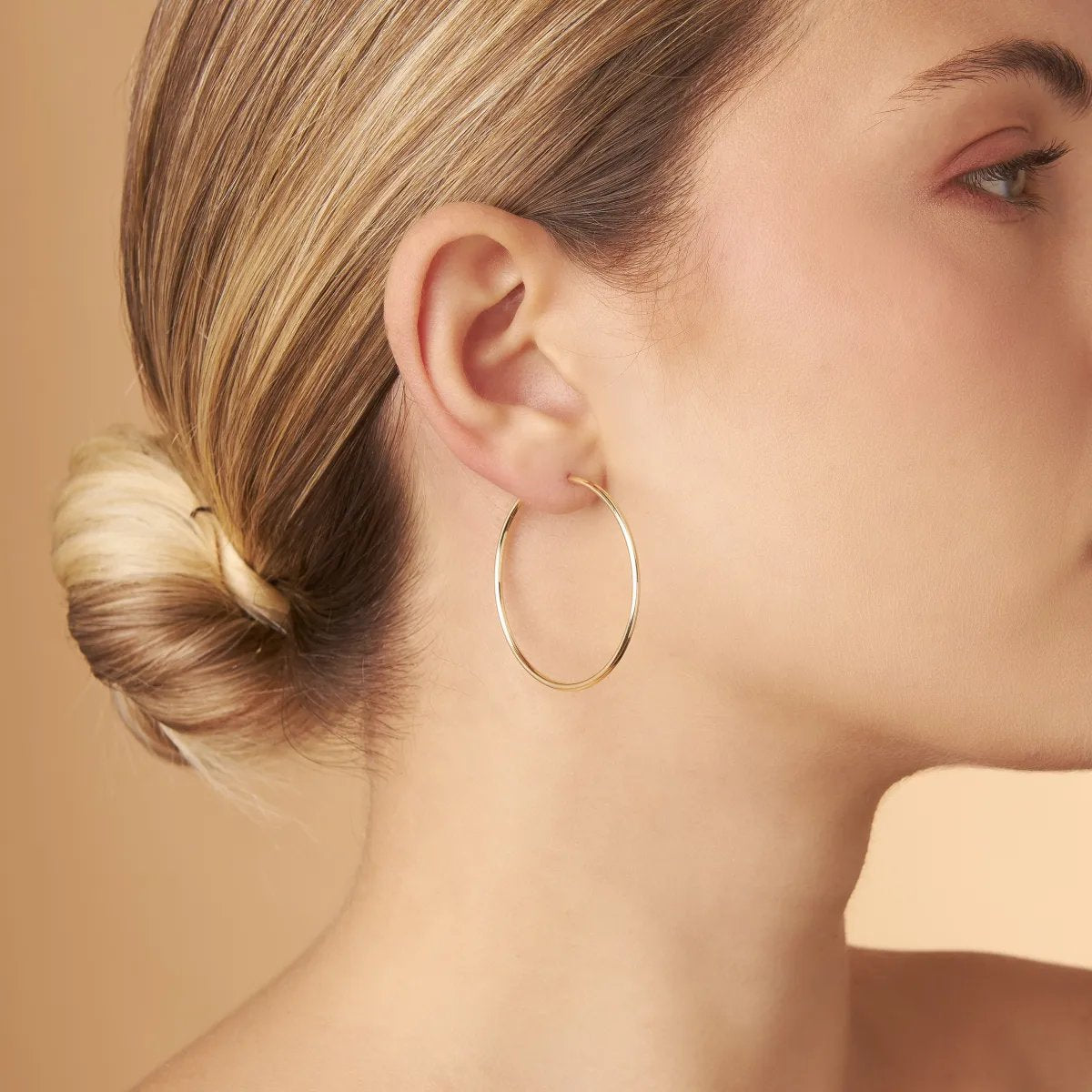 Yellow gold flex tube earrings 40 mm