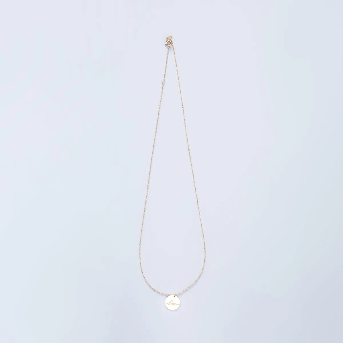 "Love" yellow gold necklace