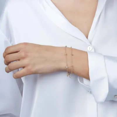 Yellow and white gold bracelet with zirconia