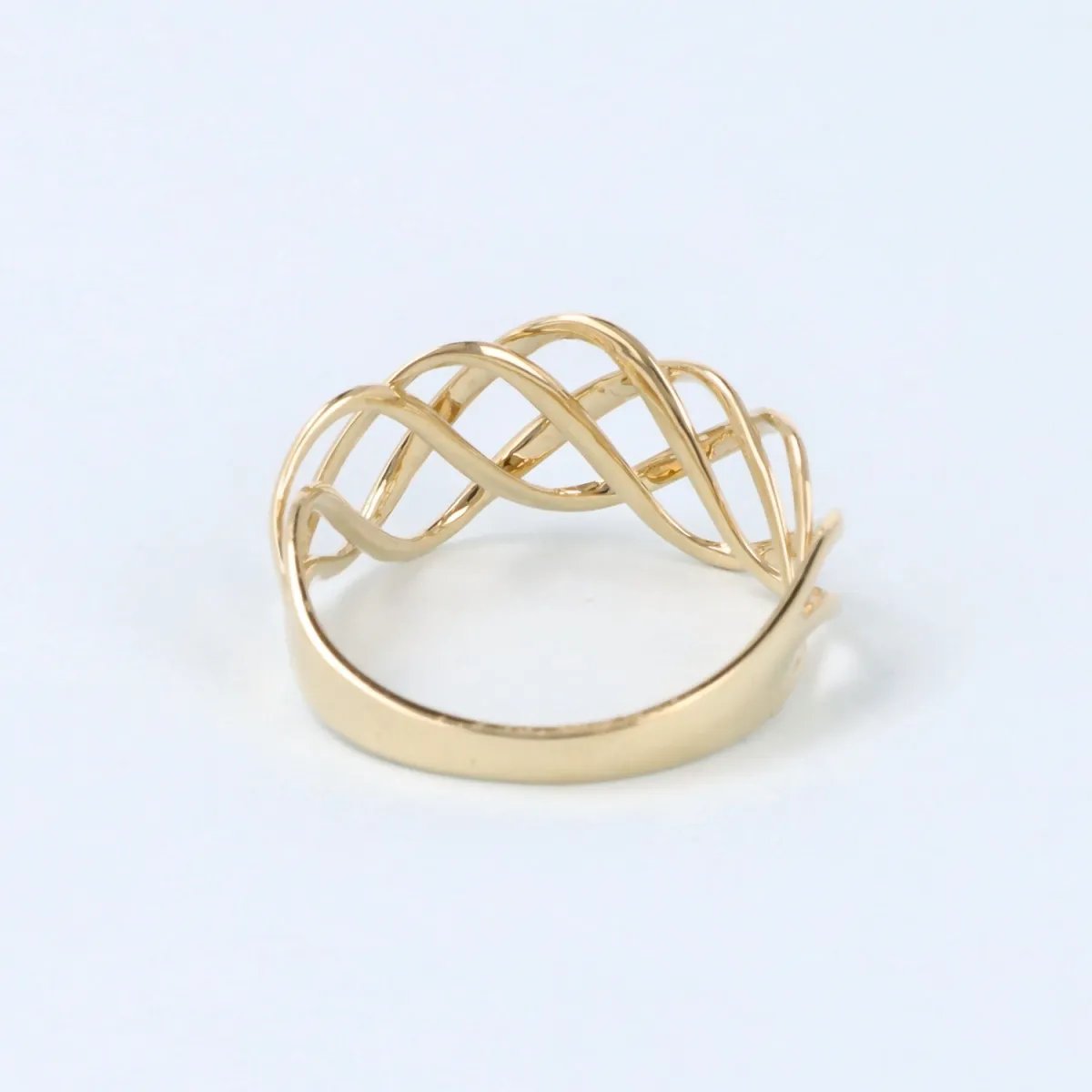 Polished yellow gold braided ring