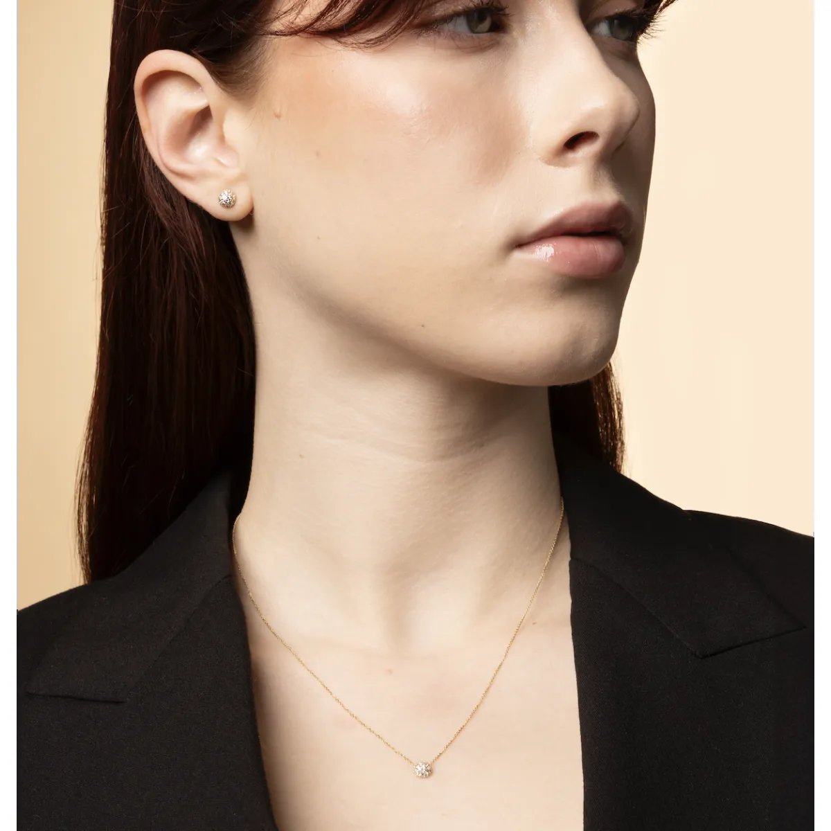 Set (necklace + earrings) in yellow gold with cubic zirconia