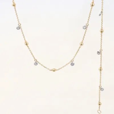 Lightweight set (bracelet and necklace) in yellow and white gold with zirconia