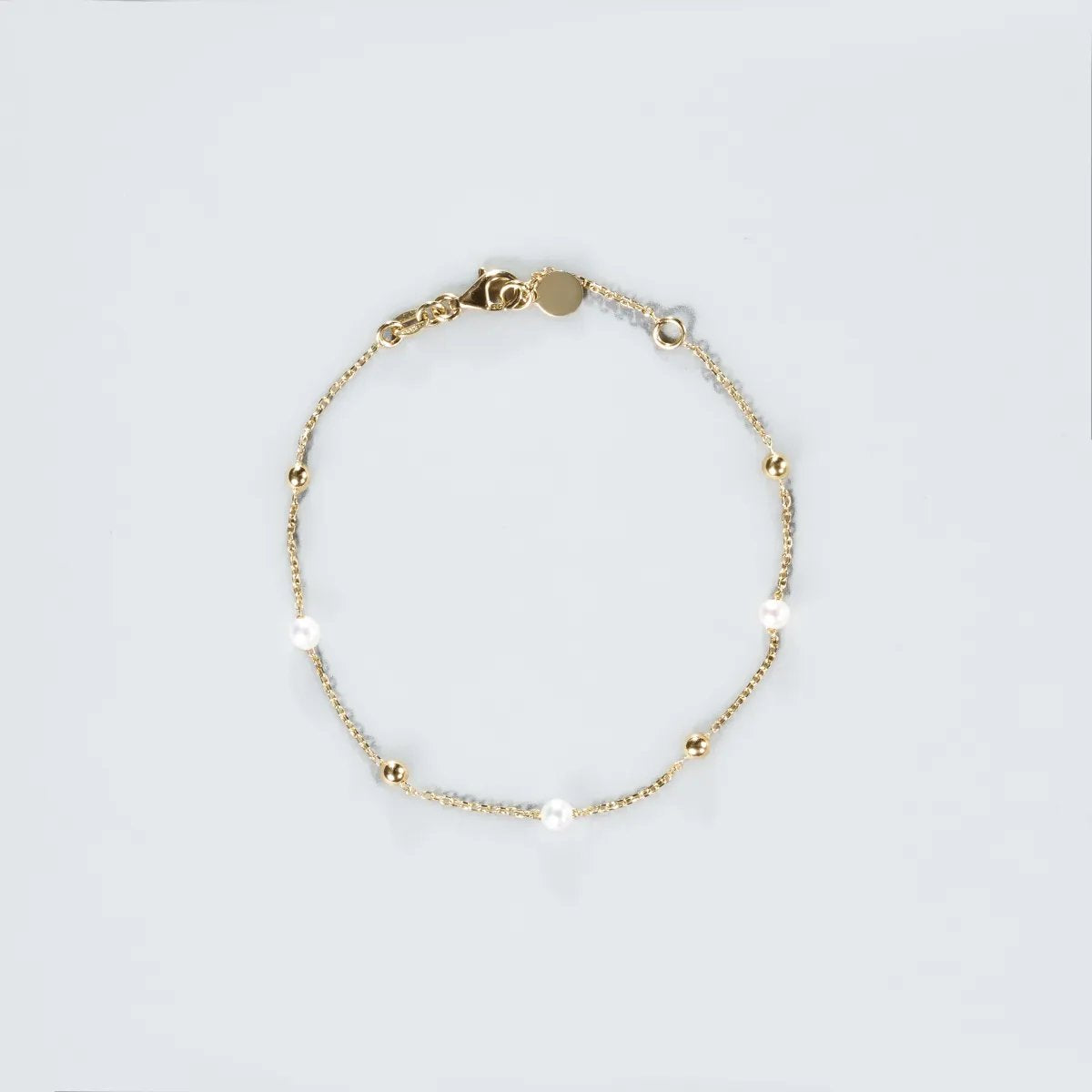 Yellow gold bracelet with pearls
