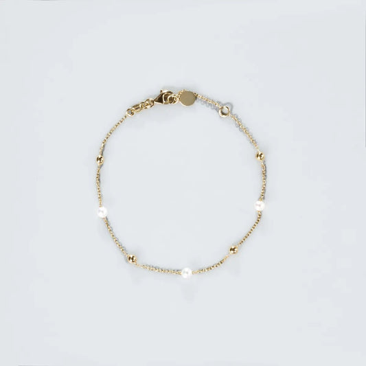 Yellow gold bracelet with pearls