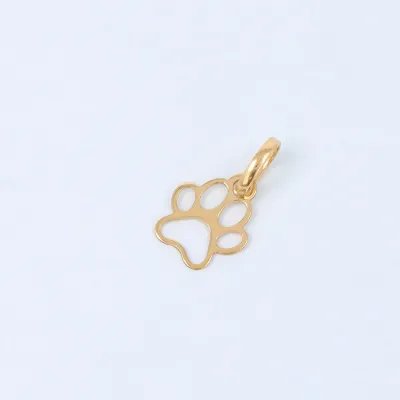 Yellow gold pendant in the shape of a dog's paw