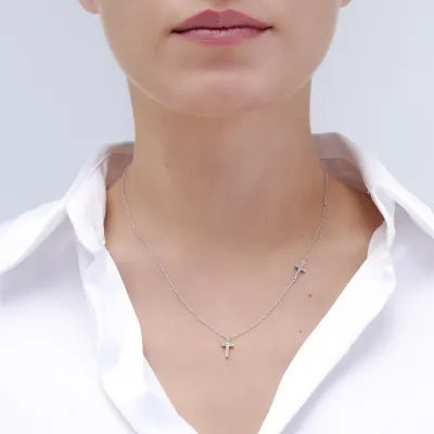 White gold necklace with two crosses and zircons