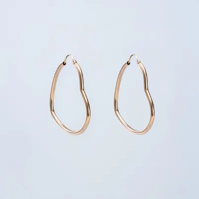 Yellow gold heart shaped tube earrings