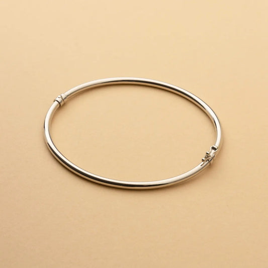 White gold round tube bangle