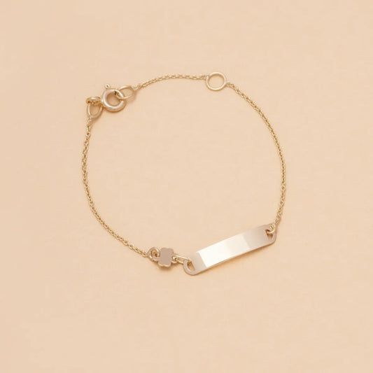 Yellow gold baby bracelet with four-leaf clover and plate