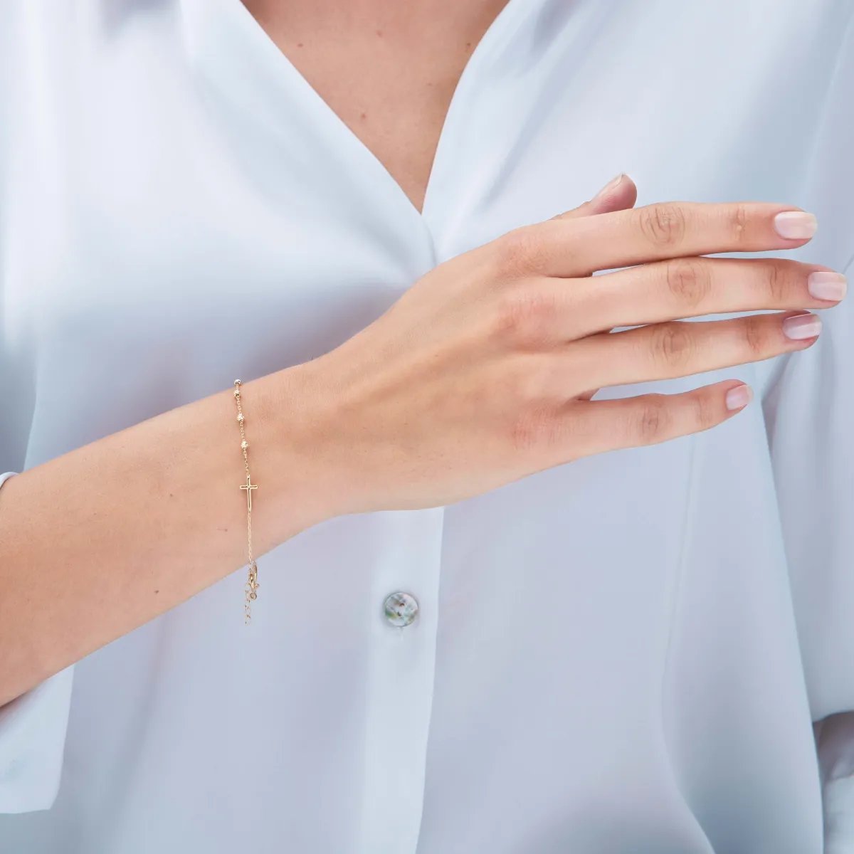 Light yellow gold rosary bracelet with cross