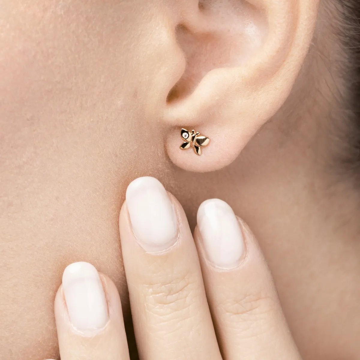 Yellow gold butterfly earrings with cubic zirconia