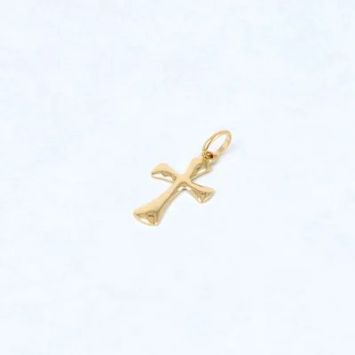 Slightly curved yellow gold cross