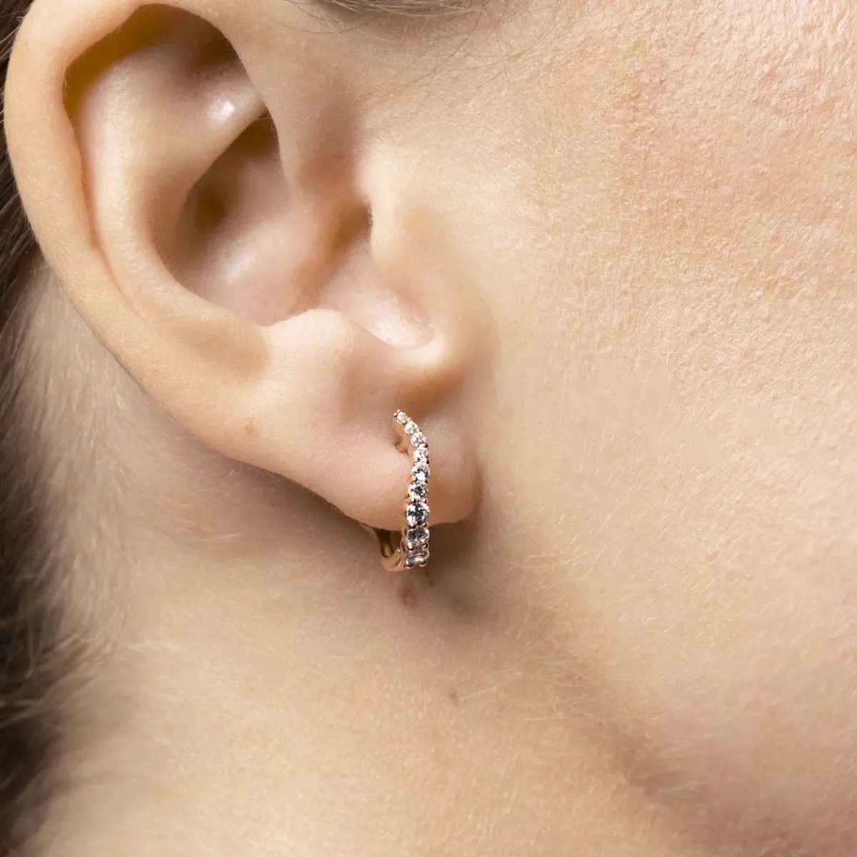 Red gold one line earrings with cubic zirconia