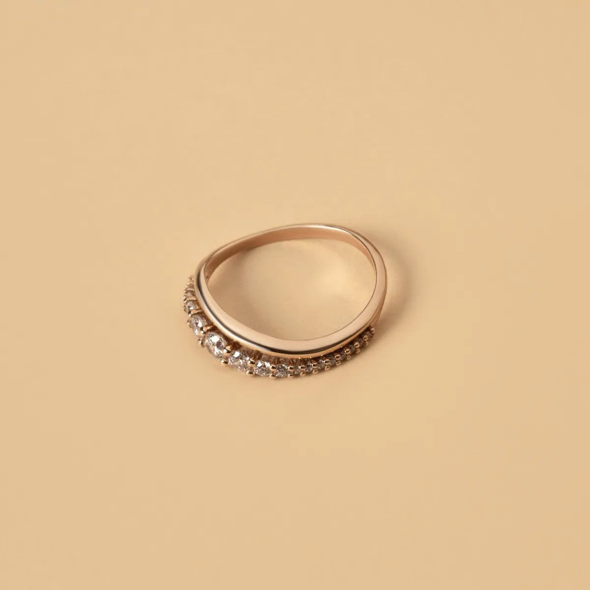 Red gold ring with cubic zirconia