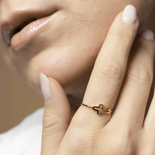 Yellow gold ring with cross sign