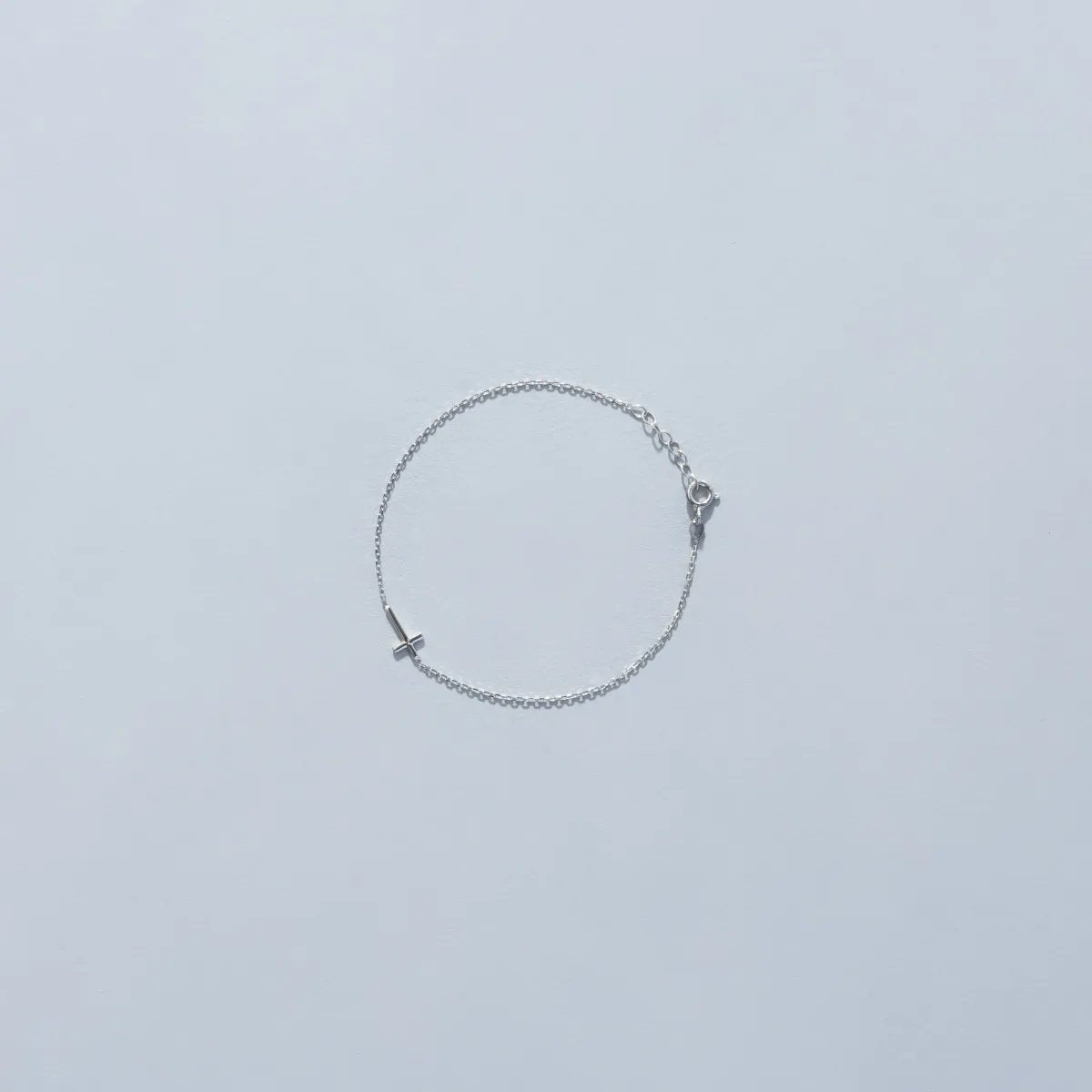 Light White Gold Bracelet with Cross
