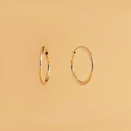 Yellow gold flex tube earrings 18 mm