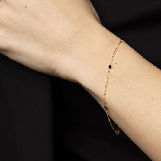 Yellow gold bracelet with black cubic zirconia