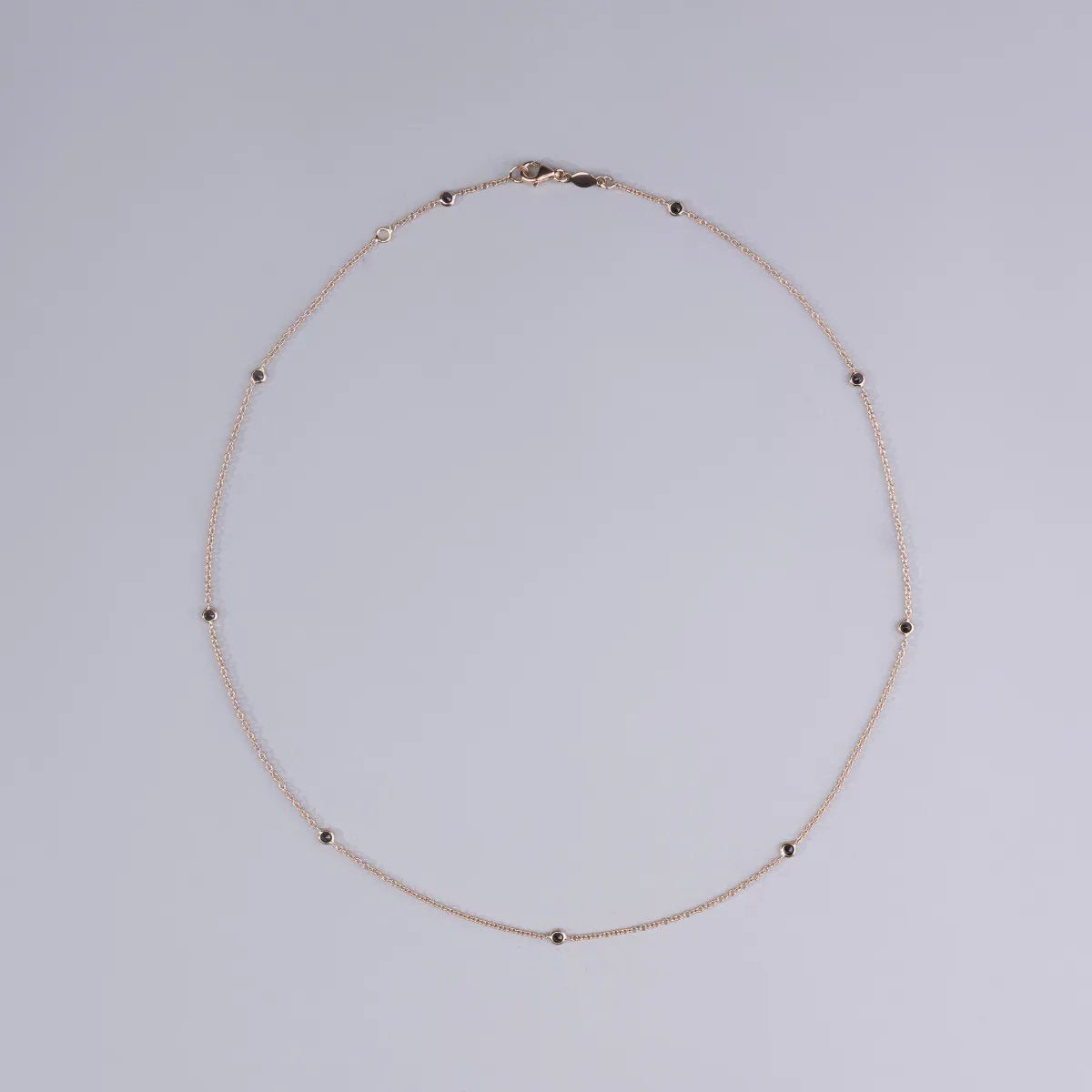 Red gold necklace with black zirconia